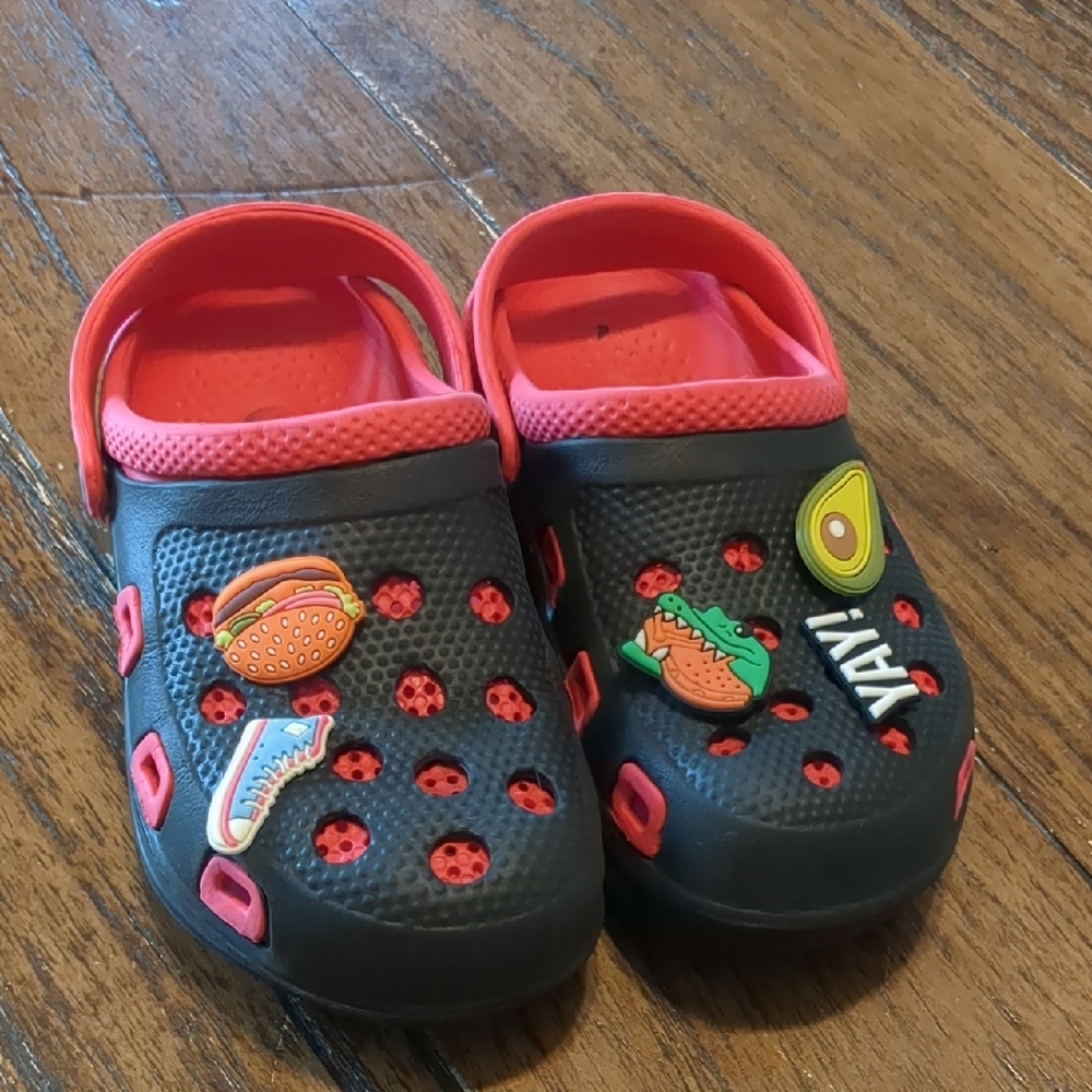 Vibrant Black and Red Water Shoes with Playful Charms